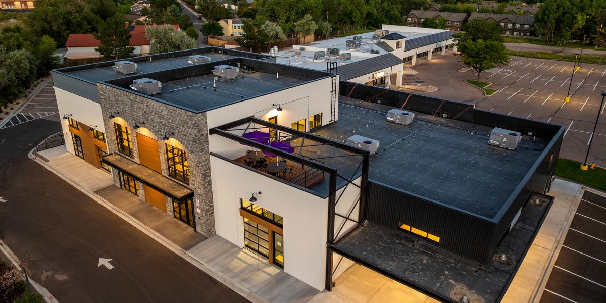 The large building at Springs Dance West including 6 studio spaces, a front desk, staff area, and lobby