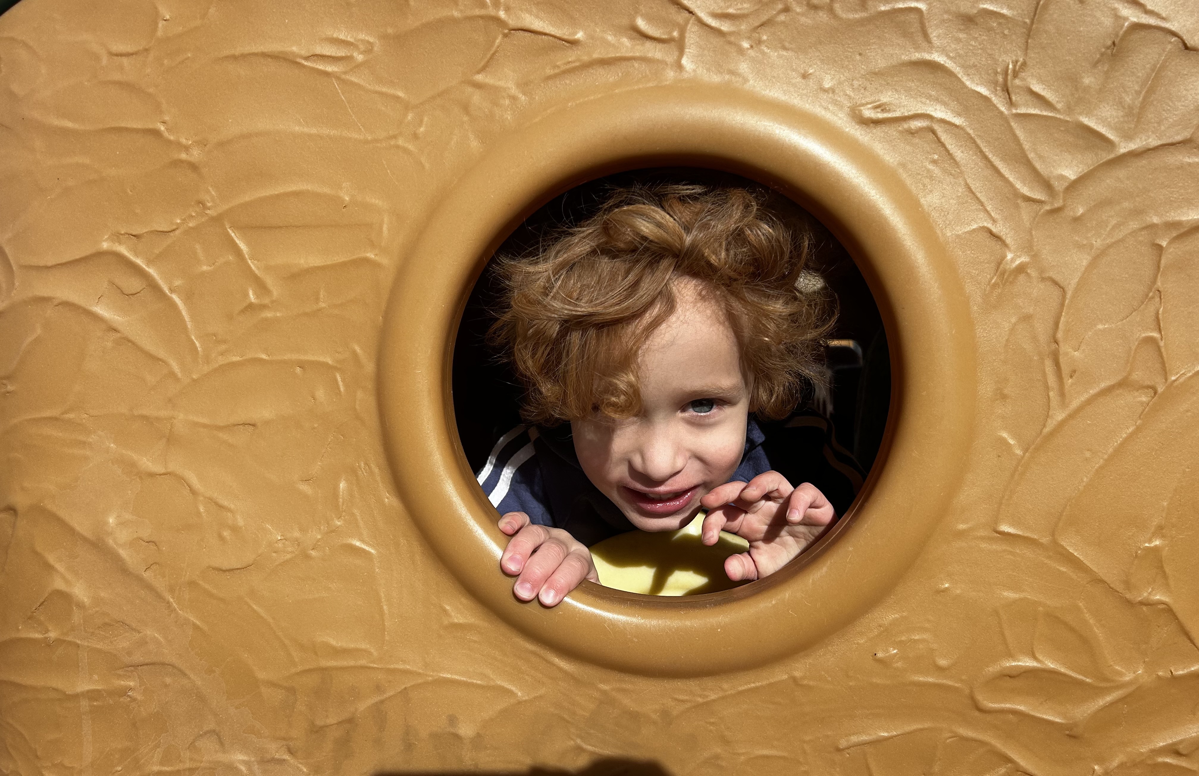 Child playing on playground