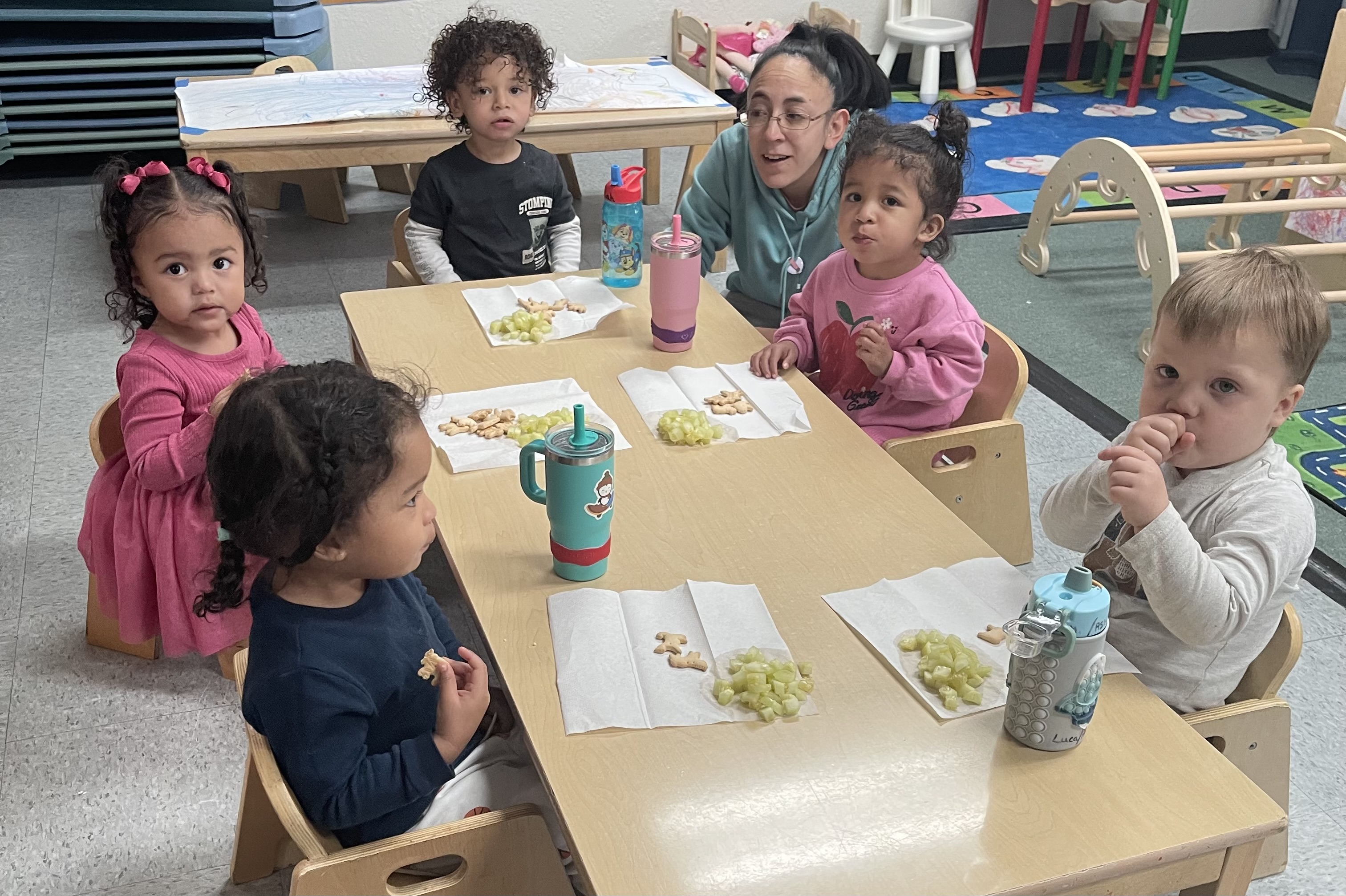 UPK serving themselves family-style at lunch